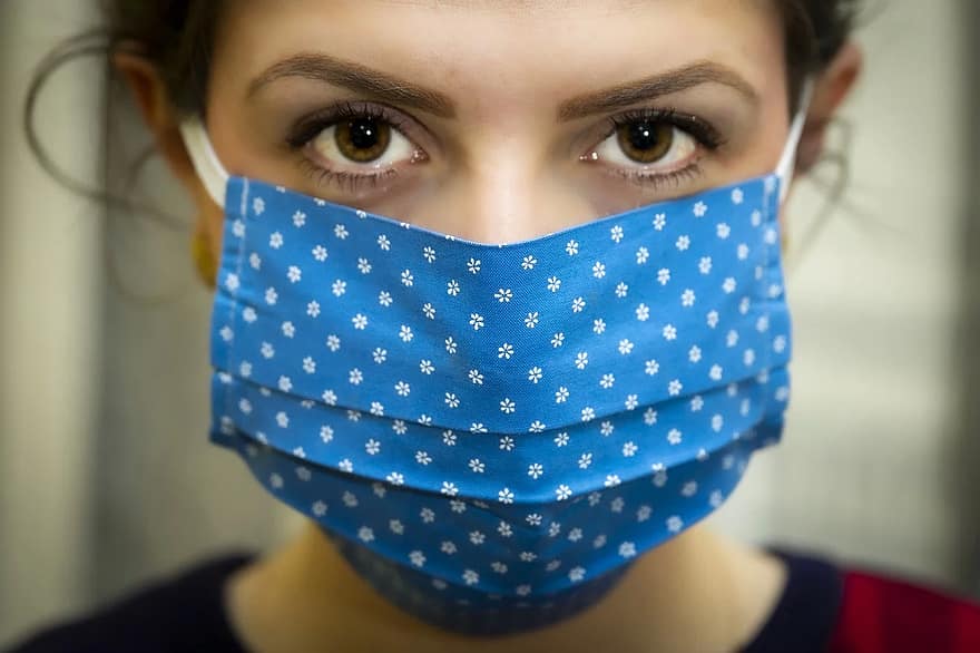 photo of woman wearing cloth mask